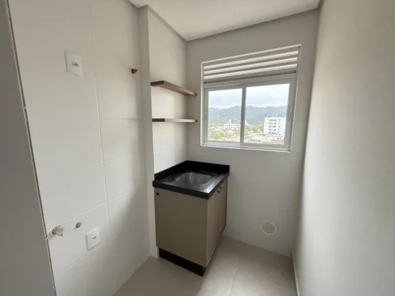 Imagem Apartamento 03 quartos, sendo 01 suíte novo e pronto para morar, na Praia de Gravatáa em Navegantes SC. Adriano Carpes Imóveis Vende