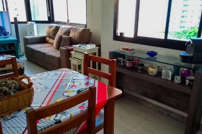 Imagem Flat com 3 dormitórios à venda, 112 m² por R$ 700.000,00 - Pitangueiras - Guarujá/SP