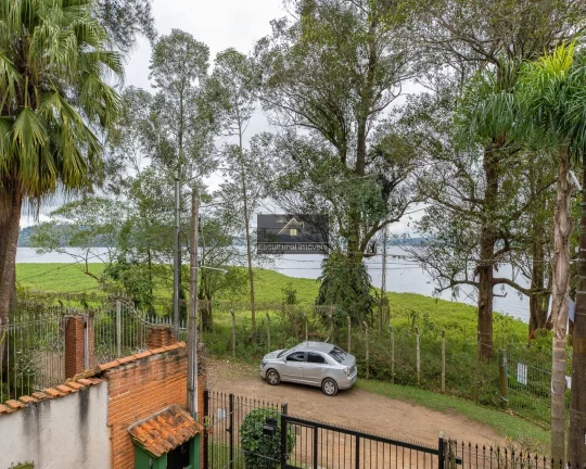 Imagem FRENTE PARA REPRESA DE GUARAPIRANGA PÉ NA ÁGUA ALTO PADRÃO SOBRADO 410,00 M CONSTRUÍDOS 3 SUÍTES 3 SALAS COZINHA AMPLA EDÍCULA 8 VAGAS ÓTIMO LOCAL