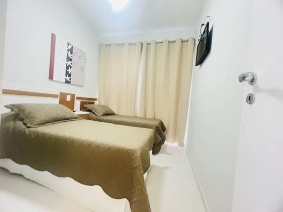 Imagem Apartamento à venda na Riviera de São Lourenço, no módulo 7: 3 quartos, 1 suíte, 2 salas, 2 vagas de garagem! Seu refúgio à beira-mar!