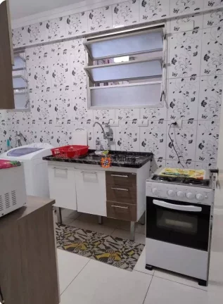 Imagem Apartamento com 2 dormitórios à venda, 63 m² por R$ 361.600 - Centro - São Vicente/SP