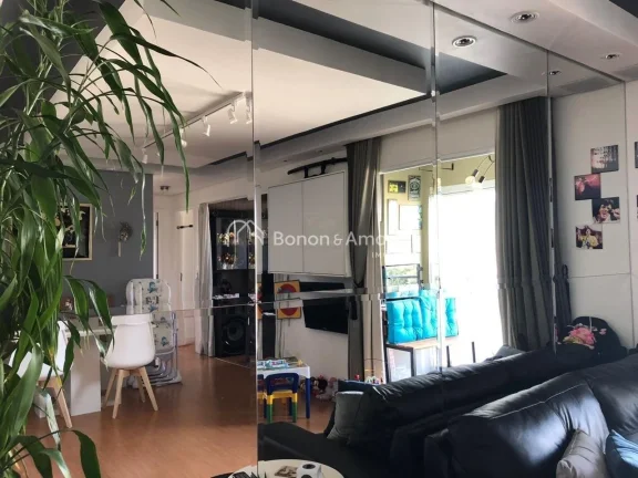 Imagem Apartamento de 75 m² em andar alto, com três quartos sendo uma suíte, sala para dois ambientes e ...