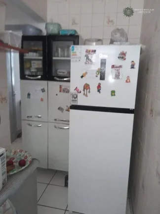 Imagem Oportunidade Única: Apartamento Compacto Pé na Areia no Jardim Guilhermina, Praia Grande!