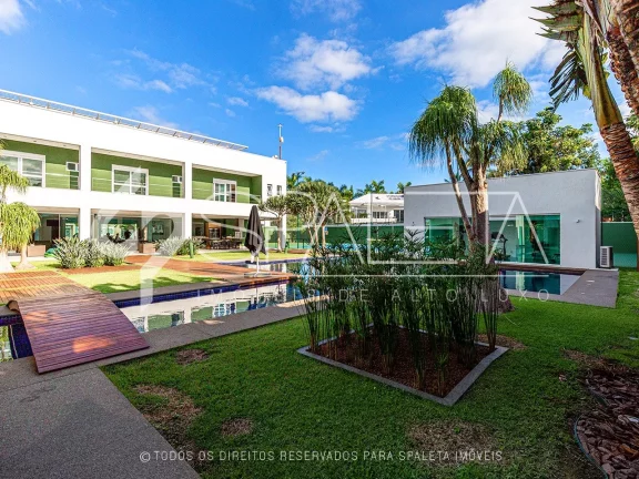 Imagem Mansão contemporânea com heliponto particular à venda no condomínio Jardim Acapulco no Guarujá