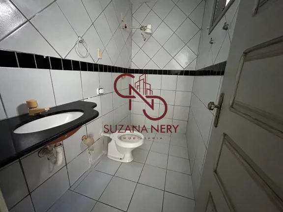 Imagem Prédio comercial com uma casa, 2 lojas e 11 kitinets