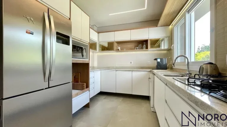 Imagem Casa de Alto Padrão no Condomínio Real Park – 3 Suítes, Vista Panorâmica e Espaç