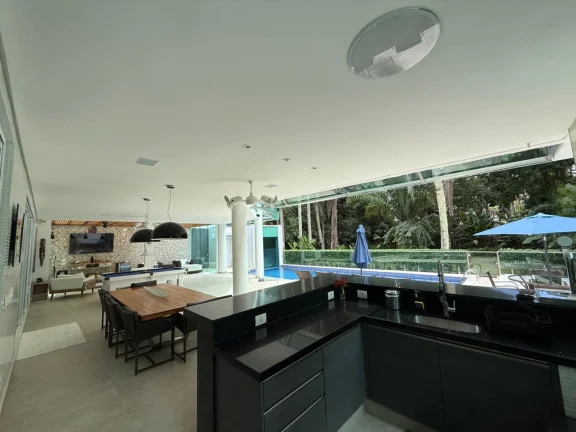 Imagem Incrível mansão à venda em Riviera de São Lourenço Módulo 21: 6 quartos, 6 suítes, 3 salas, 705m². Venha conferir!