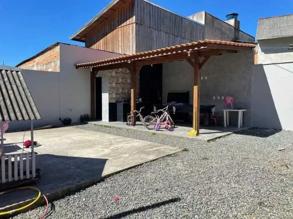 Imagem Casa com 2 dormitórios e 2 vagas de garagem em Camboriú
