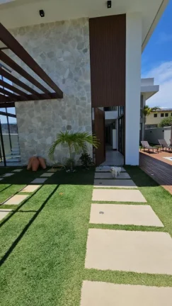 Imagem Imóvel à venda: Casa em Condomínio com Piscina no bairro GUARAJUBA, Camaçari - 422m²