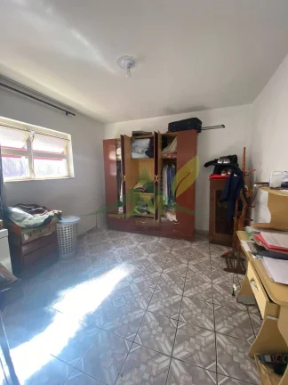 Imagem Residência à Venda na Vila Santista: Elegância, Conforto e Privacidade