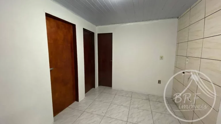 Imagem Vendo terreno com três casas e uma Kitnet em Serraria, São José SC