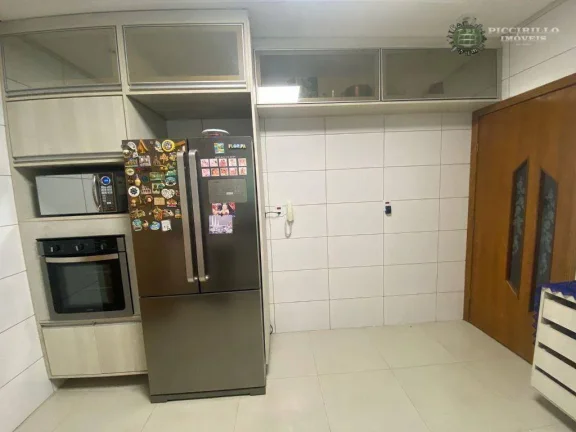 Imagem Sobrado com 3 dormitórios à venda, 180 m² por R$ 950.000,00 - Vila Guilhermina - Praia Grande/SP