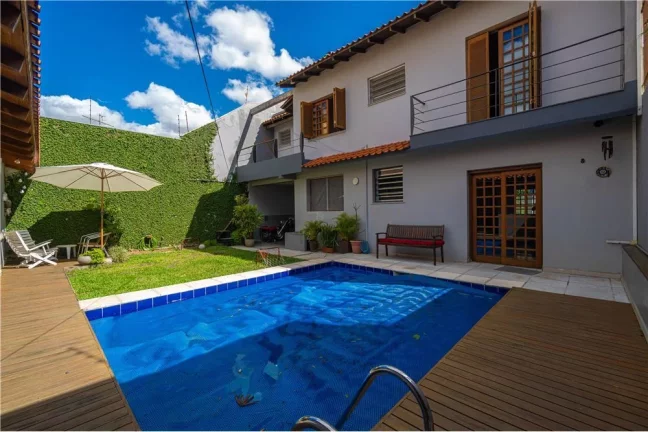 Imagem Casa com 4 Quartos à Venda, 300 m² em Jardim Lindóia - Porto Alegre