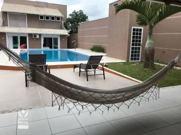 Imagem Casa 480m² com espaço gourmet e piscina, 7 quartos, 5 vagas de garagem à venda por R$ 2.500.000 - Piçarras - Guaratuba/PR