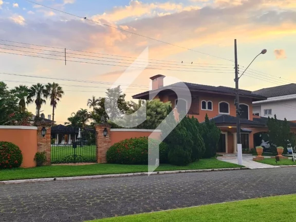 Imagem Incrível residência com arquitetura toscana à venda no renomado condomínio Jardim Acapulco no Guarujá