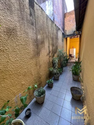 Imagem Casa com 6 dormitórios à venda, 250 m² por R$ 550.000,00 - Monte Castelo - Fortaleza/CE