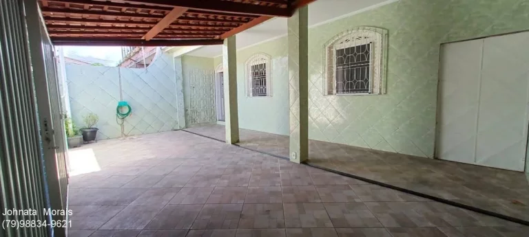 Imagem Casa em rua pública com 3 quartos, 162m² e 2 vagas de garagem - Confira!