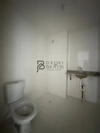Imagem Apartamento de 2 dormitórios sendo 1 suíte, prédio frente mar no bairro Vila Mirim - Praia Grande