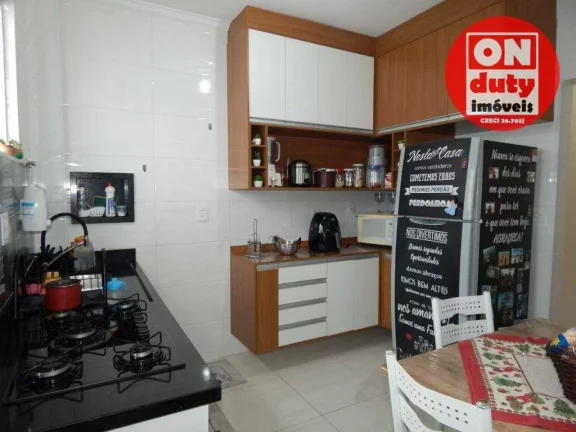 Imagem Casa com 2 dormitórios à venda, 73 m² por R$ 320.000,00 - Areia Branca - Santos/SP