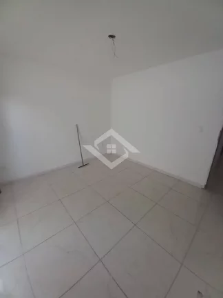 Imagem Casa na pedra de guaratiba com sala e 2 quartos, quintal e garagem