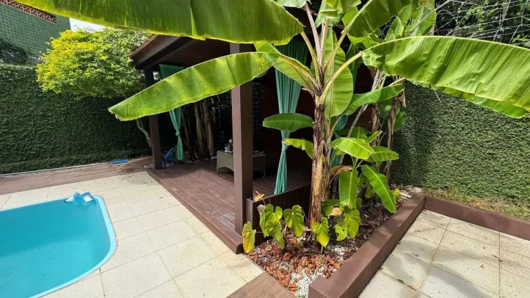 Imagem Casa com 2 lotes, 4 suítes e 2 vagas de garagem em condomínio Ariribá – Balneário Camboriú / SC