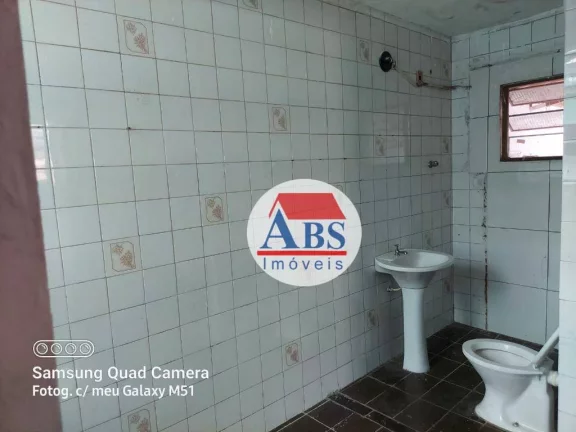 Imagem casa com duas lojas e uma edícula