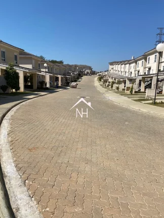 Imagem Casa em condomínio fechado com 3 suítes, 2 vagas na Ganja Viana.