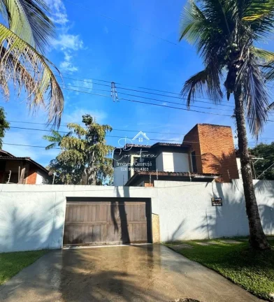 Imagem Casa Jardim Virginia com 4 quartos, 4 suítes, 3 salas e 8 vagas de garagem no Guarujá-SP, bairro Loteamento João Batista Julião!