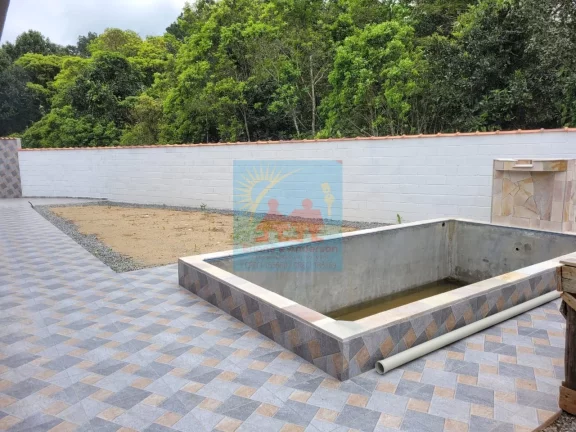Imagem Casa com piscina, com amplo espaço para por 299mil em Itanhaém