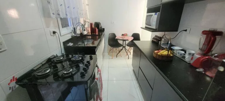 Imagem Sobrado com 2 dormitórios à venda, 56 m² por R$ 280.000,00 - Vila Caiçara - Praia Grande/SP