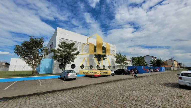 Imagem Terreno plano com 8500 m2, em 03 ruas, proximo a escolas e centro esportivo