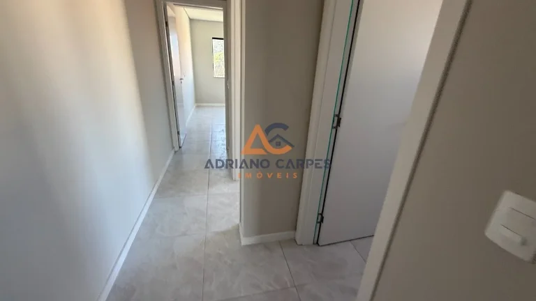 Imagem Apartamento NOVO de dois dormitórios, sendo uma suíte, sacada com churrasqueira e uma vaga de garagem no bairro de Gravatá, em Navegantes -