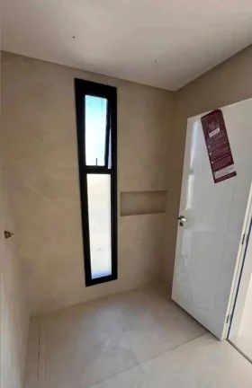 Imagem Sobrado alto padrão com 4 suítes e 2 vagas de garagem em Camboriú/SC