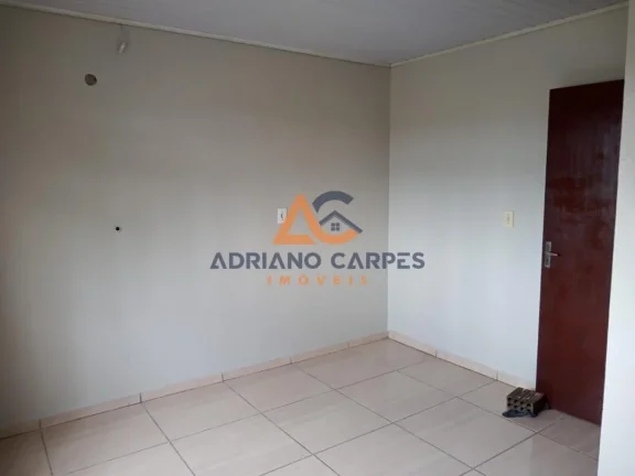 Imagem Casa com 2 dormitórios localizada no bairro Porto escalvados, em Navegantes - Adriano Carpes Imóveis Vende