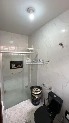 Imagem Casa padrão à venda no bairro São Benedito, Uberaba: 3 quartos, móveis planejados e porcelanato