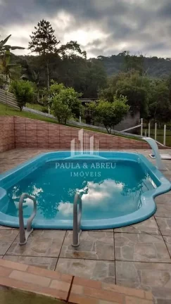 Imagem Chácara com 4 Quartos, 2 Banheiros, Área para Churrasco Grande, Piscina, Lago com Peixes, Estacionamento para 25 carros, Córrego nos fundos, espaço para fazer campo, no Rio Grande da Serra-SP