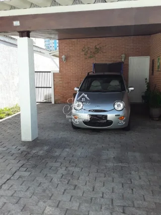 Imagem Imperdível casa à venda na Enseada, Guarujá-SP! 5 quartos, 3 suítes, 2 salas, 4 banheiros, 2 vagas de garagem. Confira!