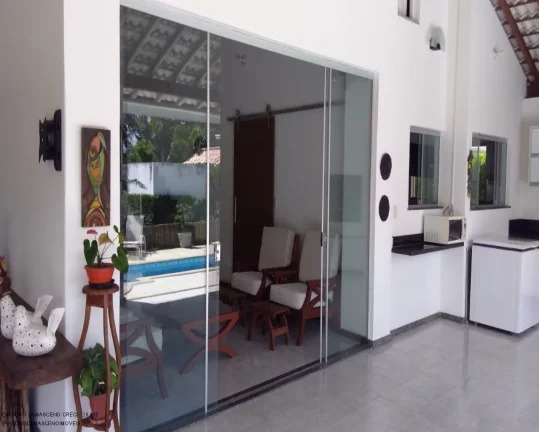 Imagem Casa de luxo em condomínio à venda em Busca Vida, Camaçari-BA: 4 quartos, 4 suítes, 2 salas, 2 banheiros, 4 vagas, 450m².