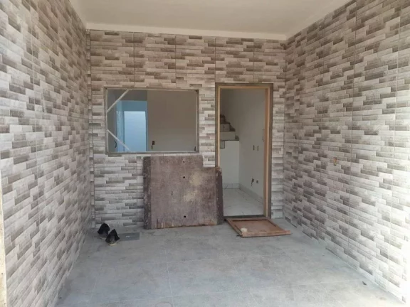Imagem Casa com 2 dormitórios à venda, 65 m² por R$ 370.000,00 - Maracanã - Praia Grande/SP