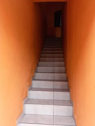 Imagem Casa sobreposta alta com 1 dormitório à venda, 90 m² por R$ 150.000 - Vila Costa Muniz - Cubatão/SP