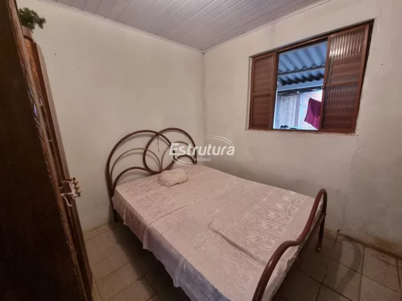 Imagem Chácara com 3 residências a poucos metros da cidade