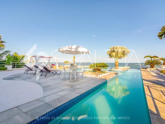 Imagem Belíssima mansão mobiliada com 10 suítes e vista para o mar à venda na Praia do Pernambuco no Guarujá