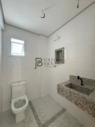 Imagem Apartamento de 2 Dormitórios sendo 1 suíte no bairro Caiçara - Praia Grande