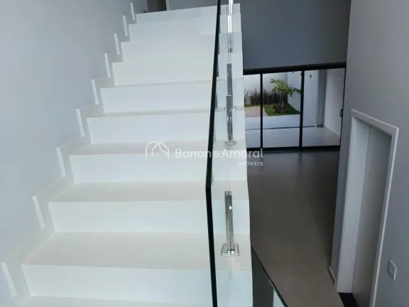 Imagem Esta linda residência combina elegância e conforto em um projeto com ambientes integrados e acabam...