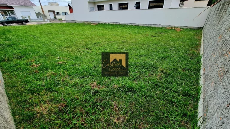 Imagem Terreno plano de 300 m² em condomínio fechado! Localizado na Praia de Fora a 600 metros da Praia! ...