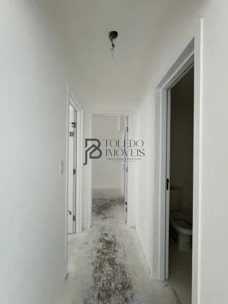 Imagem Apartamento de 2 dormitórios sendo 1 suíte, prédio frente mar no bairro Vila Mirim - Praia Grande