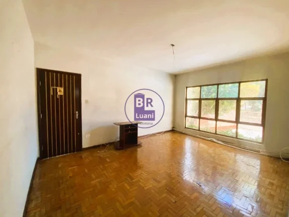 Imagem Casa térrea à venda com 12 quitinetes no fundo.