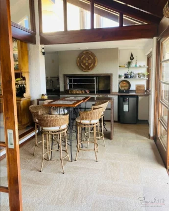 Imagem Essa casa incrível, tem uma identidade única, extremamente elegante, com muita luz e ventilação ...