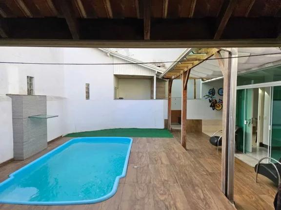 Imagem Terreno com 350 m² já com 2 Casas em processo de Condomínio no bairro Ariribá.