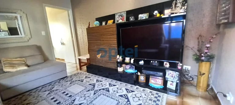 Imagem Casa Térrea com 178 m² de A.C. com 02 dormitórios, sala ampla, cozinha e 2 vagas de Garagens. Nos fundos 01 apartamento, e uma suíte na parte de cima